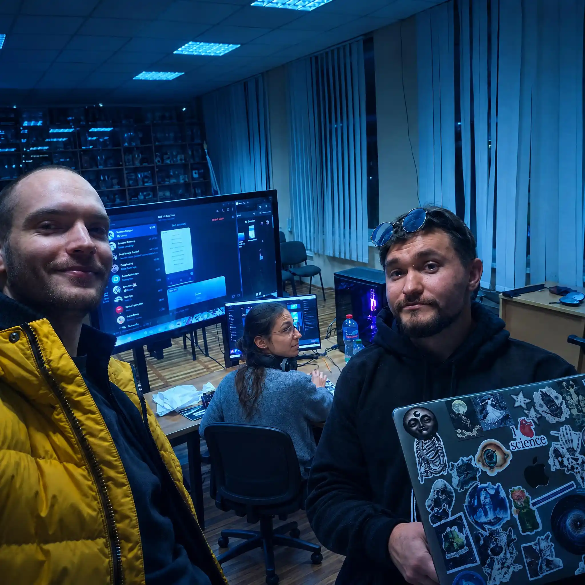 Vulpes Tech team working together on a project in the office